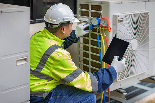 Professional Heat Pump Repair technician working in Guilford, MO